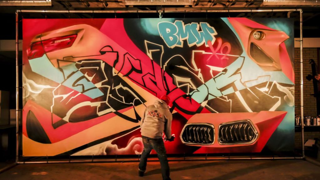 Eklor painted this graffiti backdrop BMW for Amsterdam Street Art